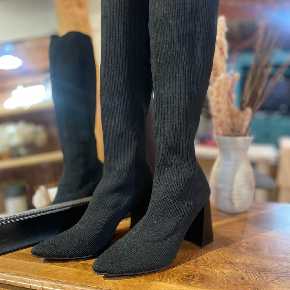 Chic black knee high sock boots